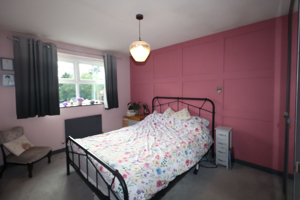 Bedroom One- click for photo gallery